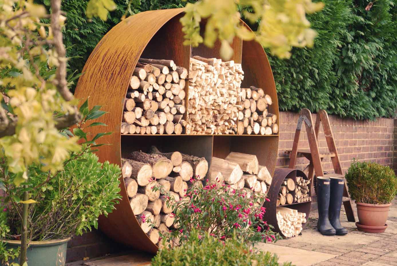 CORTEN CIRCULAR LOG STORE WOOD RUSTED PARKER AND COOP